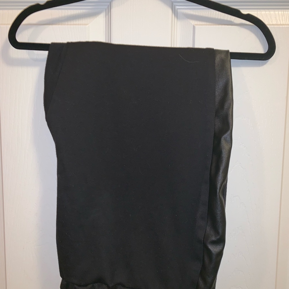 Black leggings with leather strip